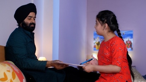 A middle-aged Punjabi Sardar with his girl kid - guidance, scolding, angry father, poor performance 